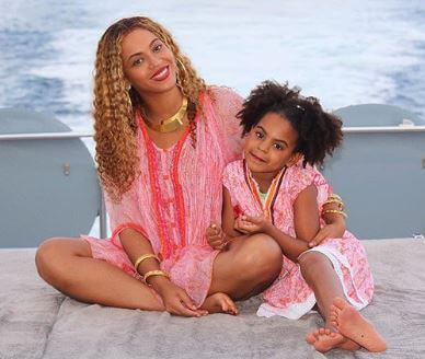 Blue Ivy Carter with her mother, Beyonce